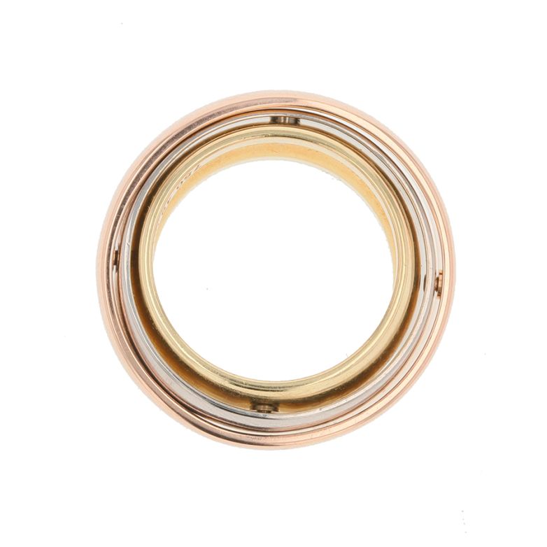Bague 3 ors signé Cartier "Trinity Must Essence" Bague 3 ors signé Cartier "Trinity Must Essence"