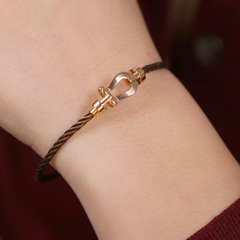 Bracelet or rose signé Bracelet or rose signé