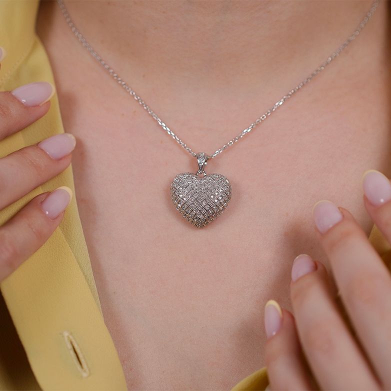 Pendentif or gris diamant (s) Pendentif or gris diamant (s)