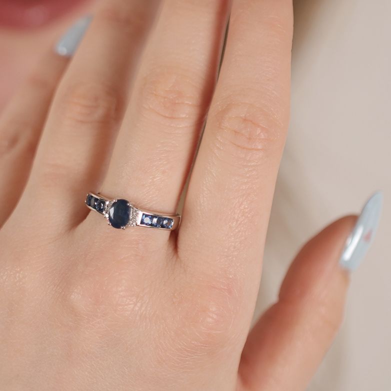 Bague or gris saphir et diamant(s) 