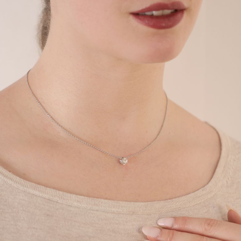 Collier or gris diamant (s) 