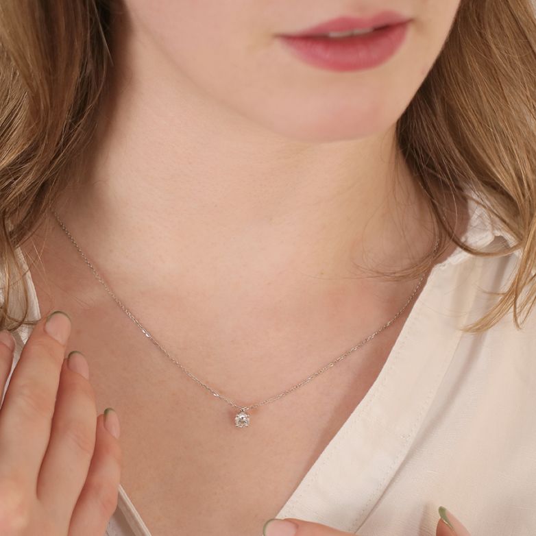 Collier or gris diamant (s) 