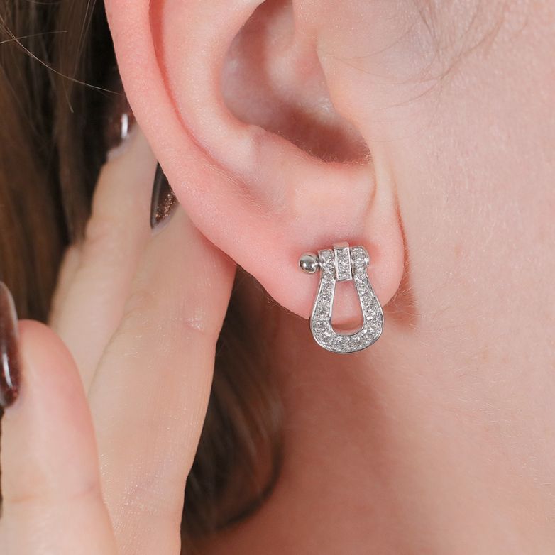 Boucles d'oreilles or gris diamant (s) signé FRED FORCE 10 moyen modèle